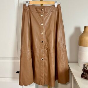 Zara Tan Button-Down Faux Leather Skirt
Waist 28
Length 30